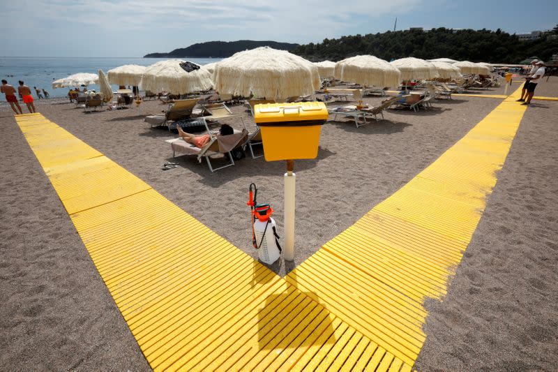 A disinfection pump and a disposal bin are seen on Splendid Hotel beach as coronavirus disease (COVID-19) heavily affects tourism in Budva