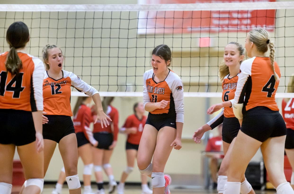 Brenna Davis (11) and her Illini Bluffs teammates celebrate their victory over Brimfield after their volleyball match Thursday, Sept. 21, 2023 at Brimfield High School. Illini Bluffs defeated Brimfield in three sets 17-25, 25-19 and 25-18.