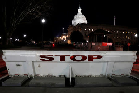 U.S. Capitol is seen shortly after beginning of the Government shutdown in Washington, U.S., January 20, 2018. REUTERS/Yuri Gripas