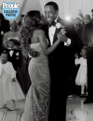 <p>Volodymyr Ivash / Ivash Studio</p> Jeremy Tardy and Tamika Waye dance at their wedding.