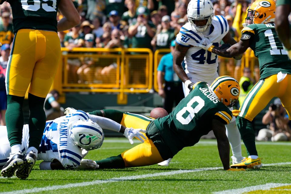 Sep 15, 2024; Green Bay, Wisconsin, USA; Green Bay Packers running back Josh Jacobs (8) fumbles the football near the goal line during the second quarter against the Indianapolis Colts at Lambeau Field. Mandatory Credit: Jeff Hanisch-Imagn Images ORG XMIT: IMAGN-880892 ORIG FILE ID: 20240915_jah_sh5_017.JPG