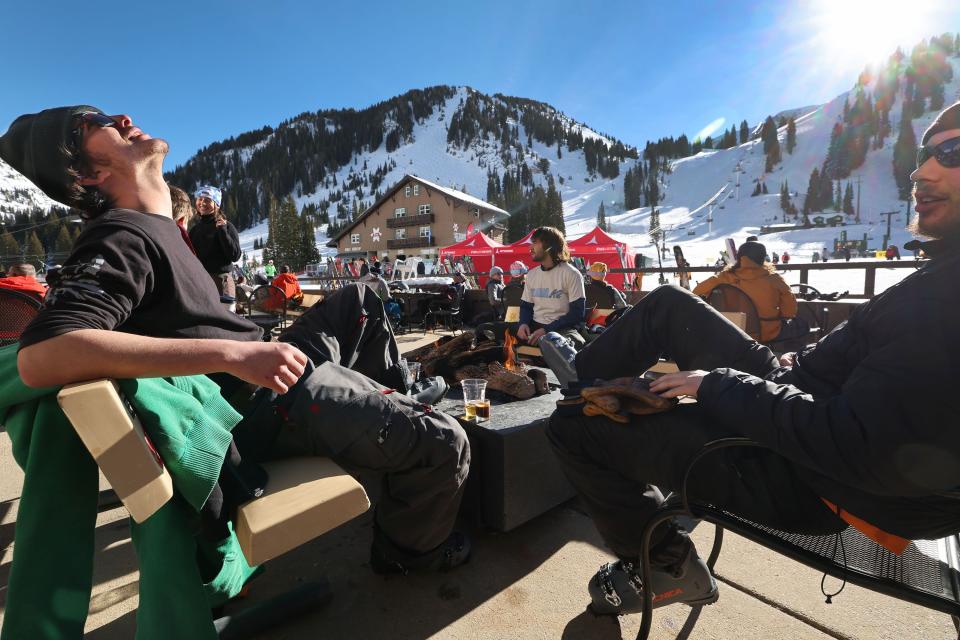 Garrett Bishop and Nick Levenson enjoy a break while skiing at Alta Ski Resort on Friday, Dec. 15, 2023. A new report details the economic might of outdoor recreation in Utah, as much as $8.1 billion in economic output. | Jeffrey D. Allred, Deseret News