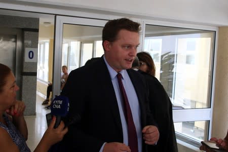 Lawyer of the legal aid group Justice Abroad Michael Polak makes statements to the press outside the Famagusta courthouse in Paralimni