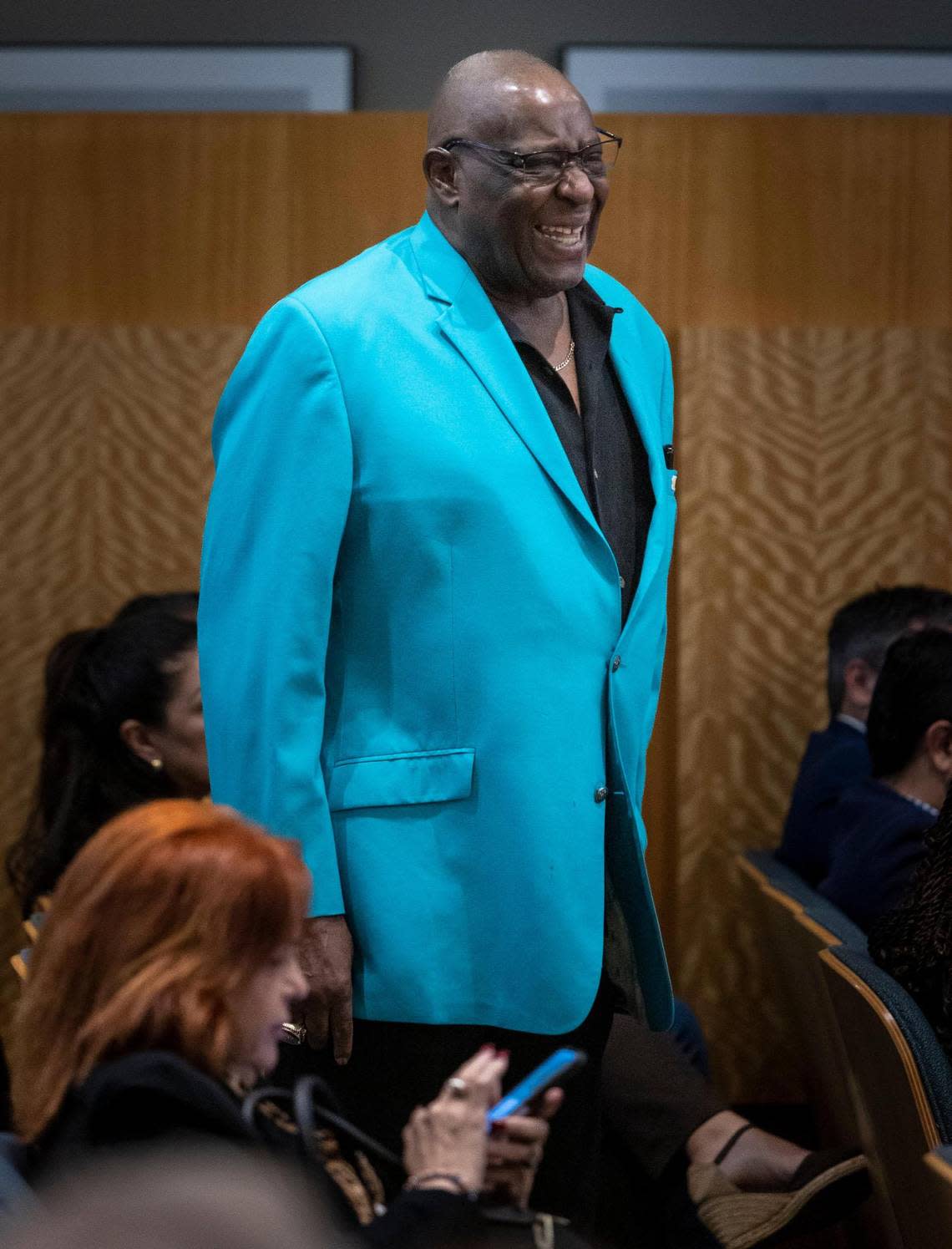 Miami, FL- January 12, 2023 - Miami Dolphins great, Larry Little smiles as he stands in the City of Miami Council Chambers. Miami City Commissioners voted unanimously to name a street after him.
