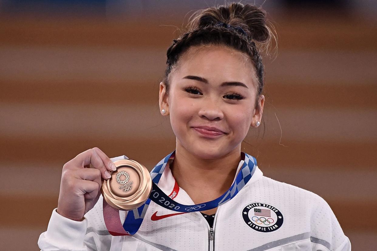 USA's Sunisa Lee poses with her bronze medal during the podium ceremony of the artistic gymnastics women's uneven bars of the Tokyo 2020 Olympic Games at the Ariake Gymnastics Centre in Tokyo on August 1, 2021.