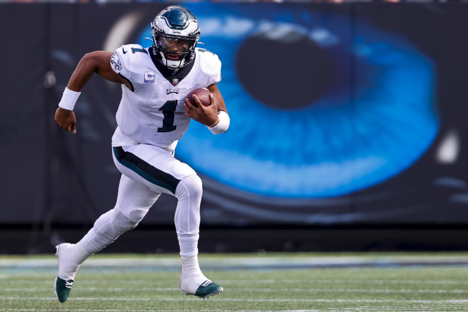 Philadelphia Eagles quarterback Jalen Hurts runs against the Carolina Panthers during the second half of an NFL football game Sunday, Oct. 10, 2021, in Charlotte, N.C. (AP Photo/Nell Redmond)