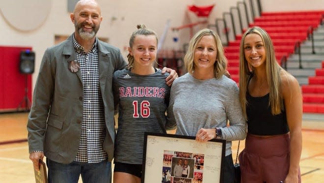 Savannah Christian volleyball coach Julie Jones, second from right, with her husband Jeff and daughters Logan (No. 16) and Landon.