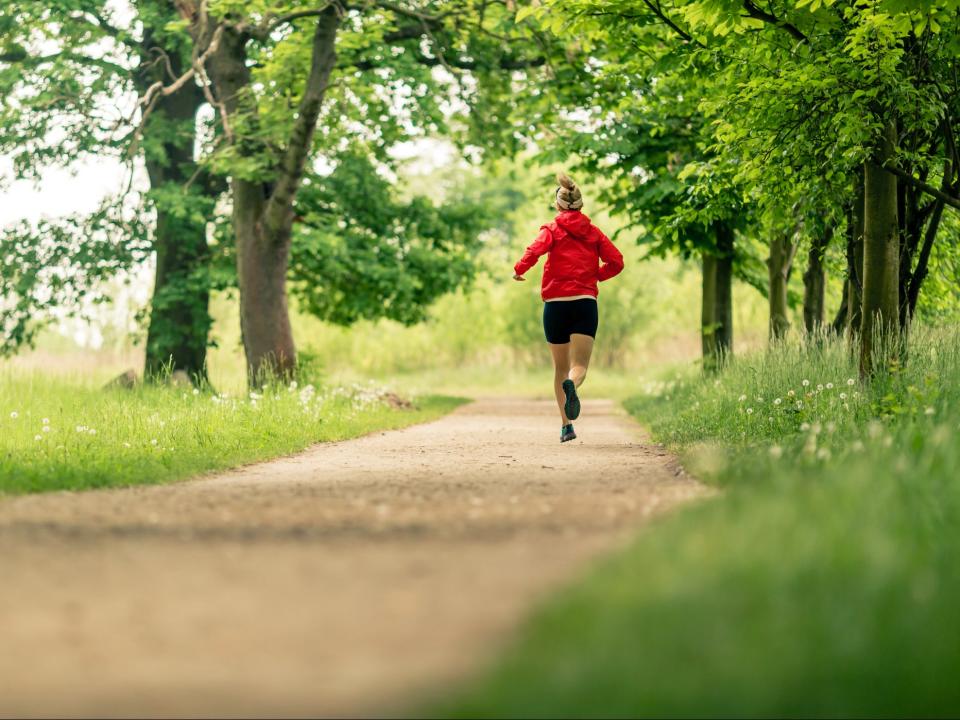 Woman runs outside (Getty Images/iStockphoto)