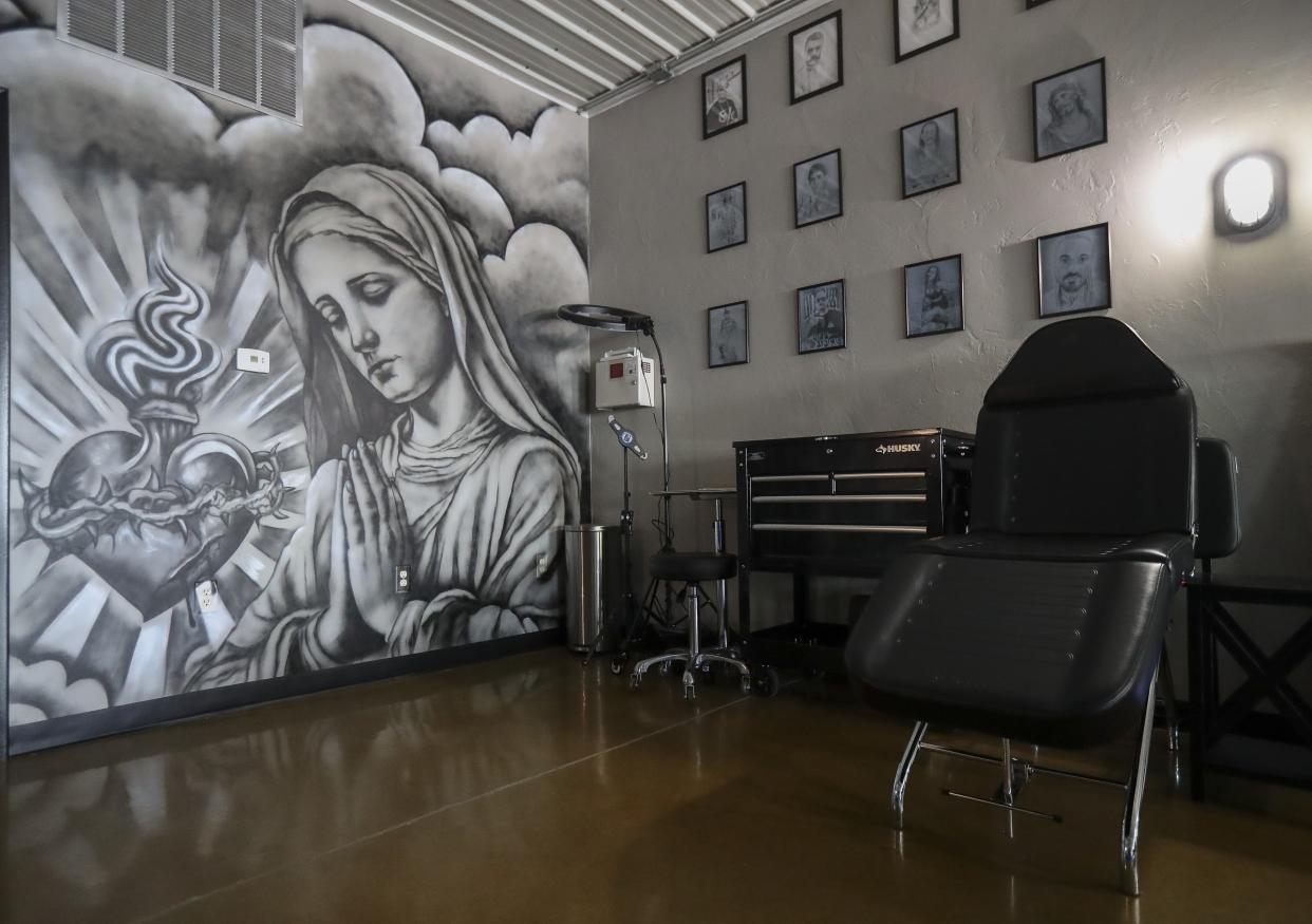 An air-brushed mural is seen on Wednesday, May 8, 2024, at Sugar Skull Tattoo in Bellevue, Wis.