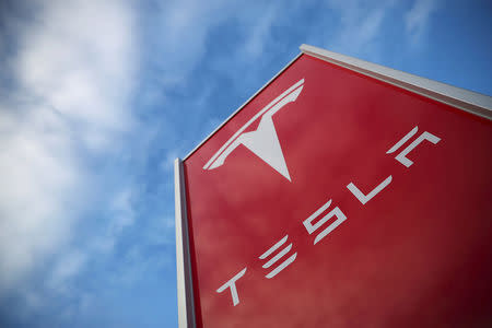 A Tesla dealership is seen in West Drayton, just outside London, Britain, February 7, 2018. REUTERS/Hannah McKay