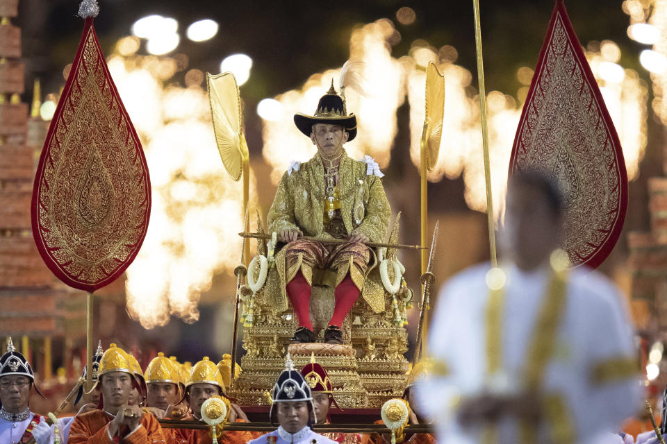 Thailand’s King Maha Vajiralongkorn is carried on a palanquin through the streets outside the Grand Palace for the public to pay homage during the second day of his coronation ceremony in Bangkok, Sunday, May 5, 2019. Vajiralongkorn was officially crowned Saturday amid the splendor of the country’s Grand Palace, taking the central role in an elaborate centuries-old royal ceremony that was last held almost seven decades ago. (AP Photo/Wason Wanichorn)