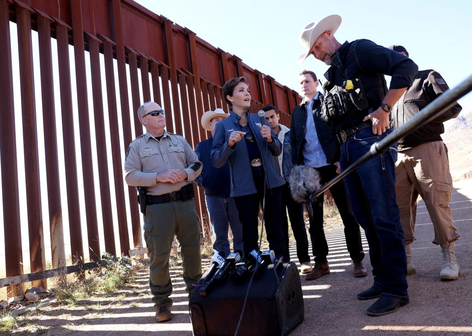 Republican Gubernatorial candidate Kari Lake holds a press conference as she tours the U.S.-Mexico border on November 04, 2022 in Sierra Vista, Arizona. Lake visited the border to outline her plan for border security. Lake was joined by (L-R) Cochise County Sheriff Mark Dannels, Arizona State Senator David Gowan, Republican Senate Candidate Blake Masters and Final County Sheriff Mark Lamb.