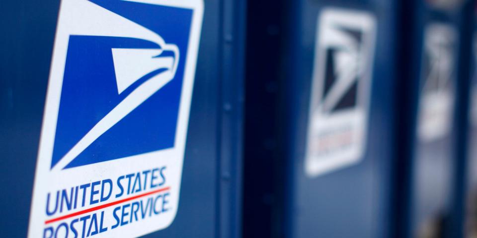 FILE PHOTO: A view shows U.S. postal service mail boxes at a post office in Encinitas, California in this February 6, 2013, file photo. .  REUTERS/Mike Blake