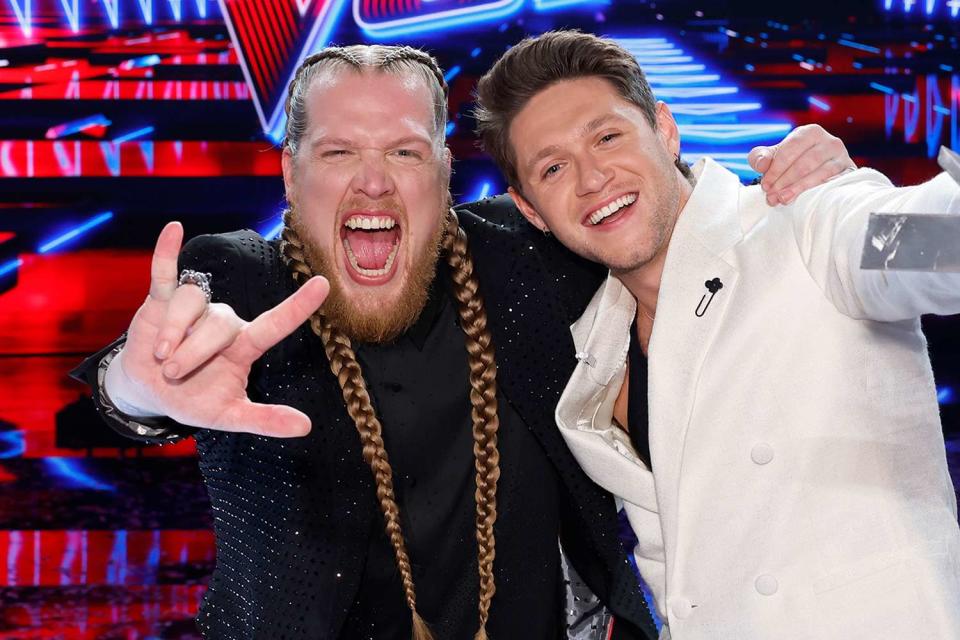 <p>Trae Patton/NBC via Getty</p> Huntley with his coach Niall Horan after his win during the live finale on Dec. 19, 2023.