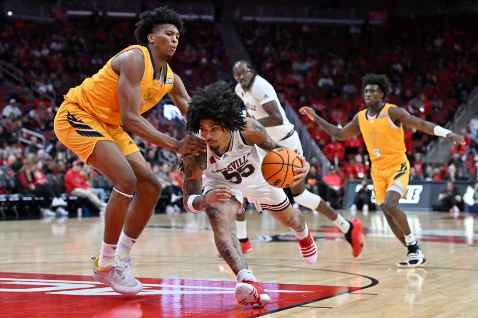 Louisville guard Skyy Clark (55) has helped lead the team to four victories this season.