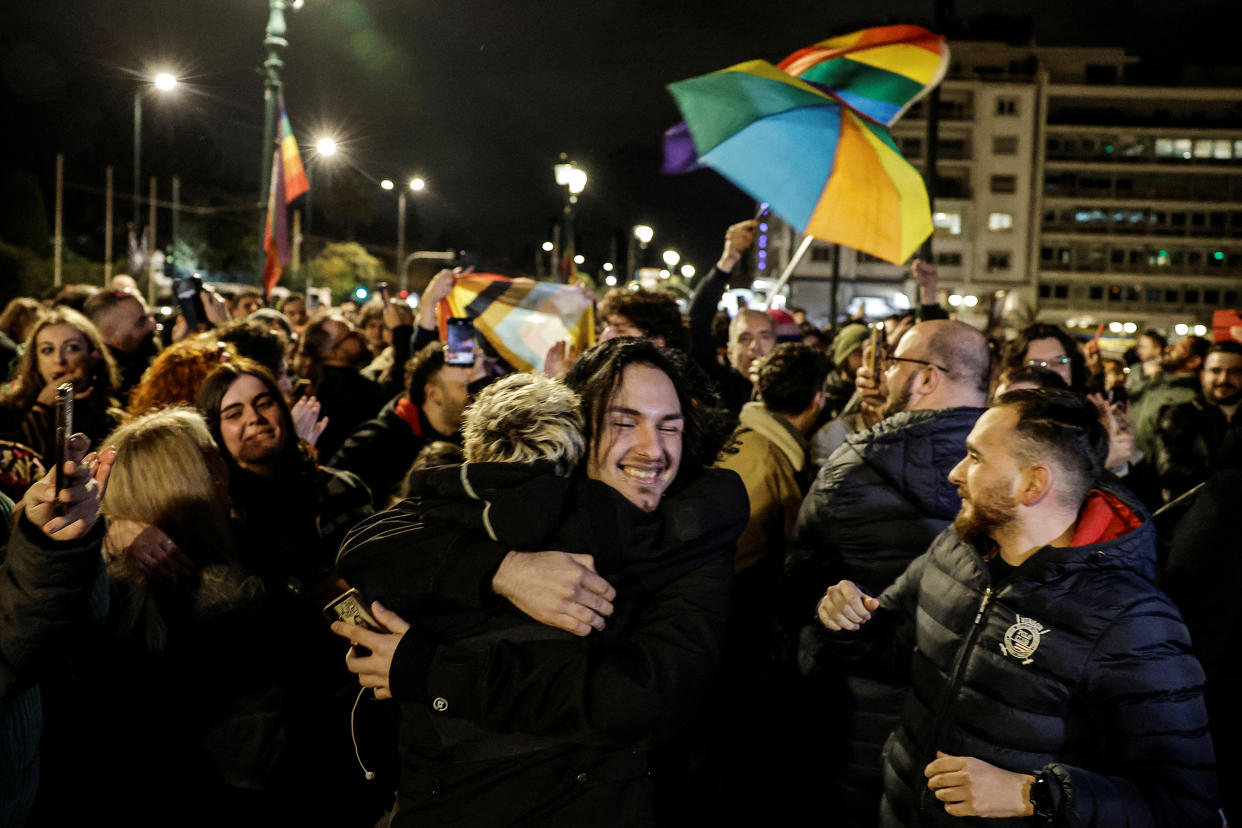 Members of the LGBTQ+ community and supporters celebrate in front of the Greek parliament, after legislation was approved allowing same-sex marriages, in Athens, Greece, Feb. 15, 2024. <span class="copyright">Louisa Gouliamaki—Reuters</span>
