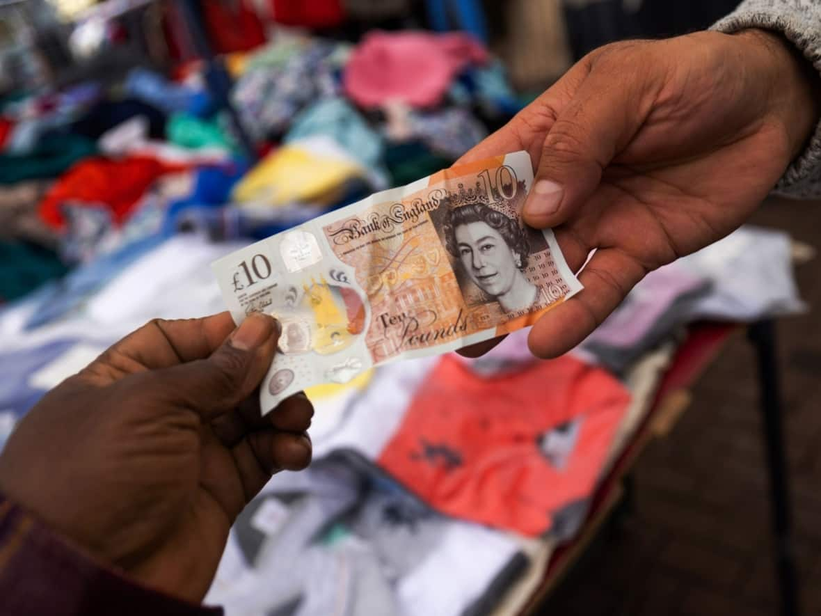 The British pound was changing hands at barely above parity with the U.S. dollar on Monday, its lowest level in decades. (Chris Ratcliffe/Bloomberg - image credit)