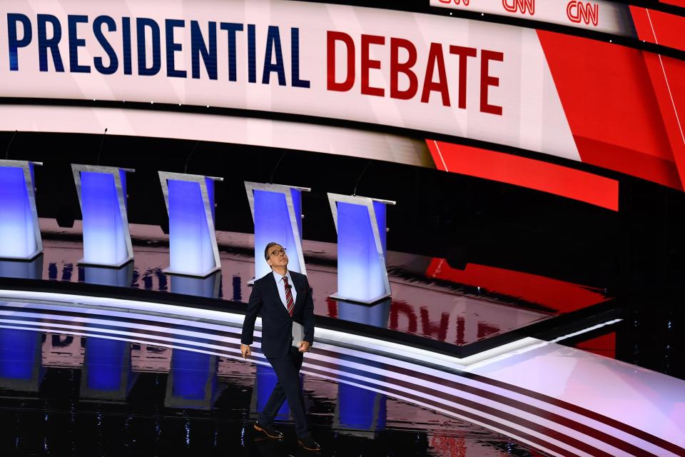 Moderator CNN chief Washington correspondent Jake Tapper walks onstage ahead of the first round of the second Democratic primary debate of the 2020 presidential campaign season hosted by CNN at the Fox Theatre in Detroit, Michigan on July 30, 2019.