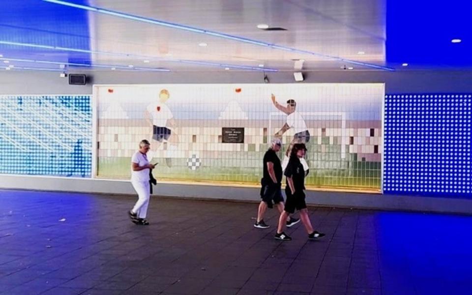 Footballers mural in the Bobby Moore Bridge subway (Philip Grant)