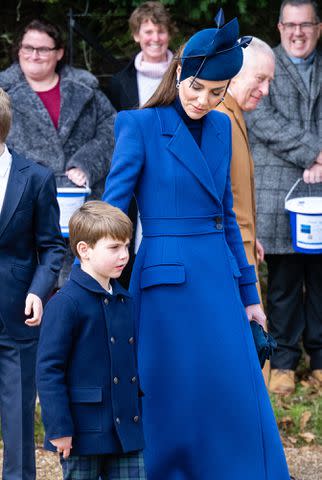 <p>Samir Hussein/WireImage</p> Prince Louis and Kate Middleton on Christmas 2023