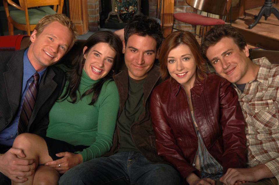 From left: "How I Met Your Mother" costars Neil Patrick Harris,Cobie Smulders, Josh Radnor, Alyson Hannigan, and Jason Segel sitting together.