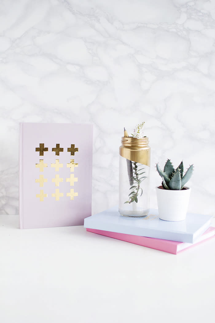 Jazz up a plain notebook in 5 minutes flat with gold contact paper