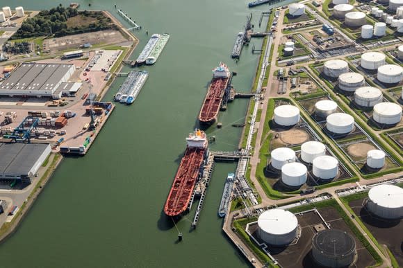 Aerial view of gas carriers at a port.