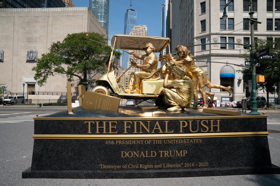 The Trump Statue Initiative put on this performance art piece that criticized the president's handling of the coronavirus pandemic as well as his insults of America's war dead. (Photo: BRYAN R. SMITH via Getty Images)