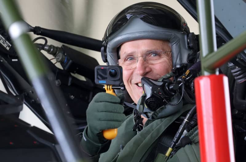 Jens Stoltenberg, NATO Secretary General, prepares to fly in a Eurofighter during his visit to Tactical Air Wing 73 "Steinhoff". During his visit, Stoltenberg wants to get a personal impression of the capabilities of the air force's Quick Reaction Alert (QRA). Bernd Wüstneck/dpa