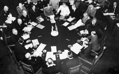 Marchal Stalin, President Truman, and Premier Attlee areamong the delegates at the Potsdam conference.  - Credit: Hulton Deutsch/Corbis Historical