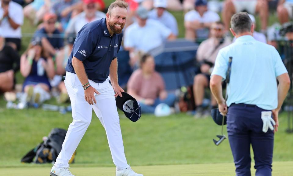 <span>Shane Lowry looks at Justin Rose after equalling the major record with a 62 at Valhalla.</span><span>Photograph: Michael Reaves/Getty Images</span>