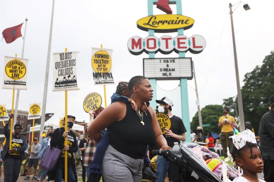 People march through the streets of Downtown Memphis, from Robert R. Church Park to the National Civil Rights Museum, with the Poor People's Campaign: A National Call for Moral Revival championing social justice movements on Monday, May 23, 2022.