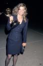 <p>Winning for "Midnight Caller," Kay Lenz dons a navy suit and skirt combination. </p>