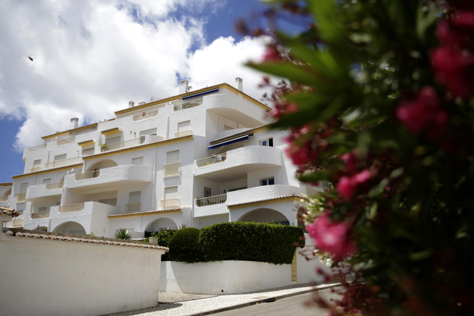 A view of the block of apartments from where British girl Madeleine McCann disappeared in 2007, in Praia da Luz, in Portugal's Algarve coast, Thursday, June 4, 2020. German police have identified a 43-year-old imprisoned German citizen as a suspect in the 2007 disappearance in Praia da Luz of British girl Madeleine McCann. (AP Photo/Armando Franca)