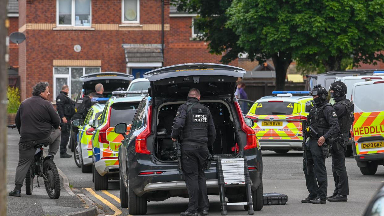 large police presence in the street following the attack