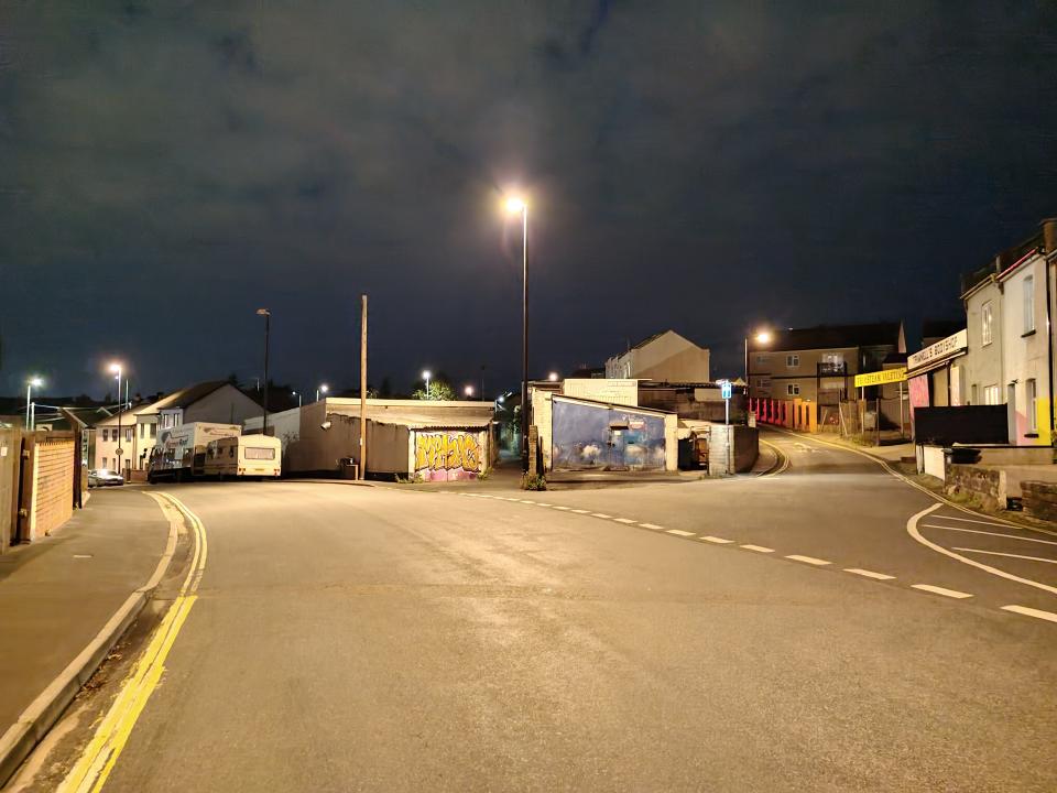 An image of a road at night