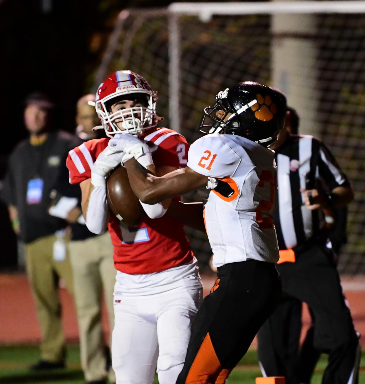 Withrow's Terhyon Nichols (21) defends against Kings' Michael Mussari in an OHSAA Division II second-round football playoff game on Nov. 4, 2022. Nichols committed to Kentucky on July 2.