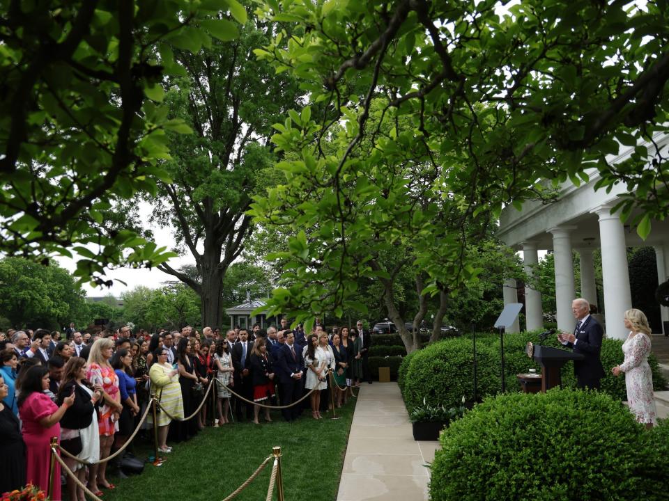 U.S. President Joe Biden speaks as first lady Jill Biden listens during a Cinco de Mayo reception at the Rose Garden of the White House May 5, 2022 in Washington, DC.