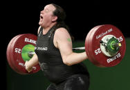 FILE - In this April 9, 2018 file photo, New Zealand's Laurel Hubbard reacts after failing to lift in the snatch of the women's +90kg weightlifting final at the 2018 Commonwealth Games on the Gold Coast, Australia. Hubbard will be the first transgender athlete to compete at the Olympics. Hubbard is among five athletes confirmed on New Zealand's weightlifting team for the Tokyo Games.(AP Photo/Mark Schiefelbein,File)