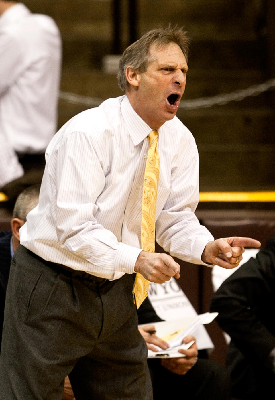 University of Wyoming head coach Larry Shyatt reacts to a call Tuesday, Feb. 11, 2014 during the Cowboys NCAA mens basketball game against the San Diego State Aztecs at the Arena-Auditorium in Laramie, Wyo.(AP Photo/Jeremy Martin)