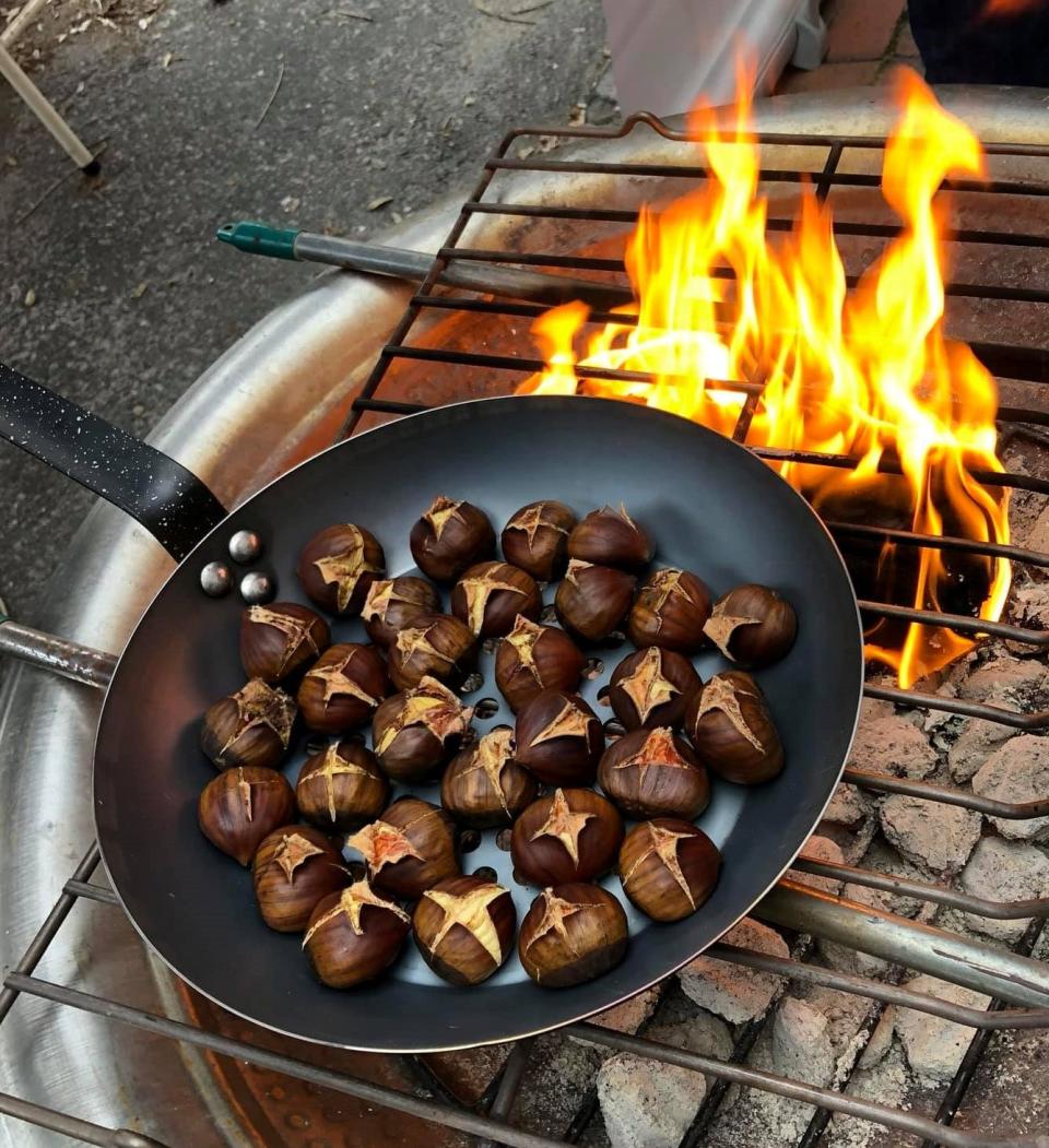 Chestnuts roasting along the parade route during "An Old Towne Christmas" in Petersburg in 2019.