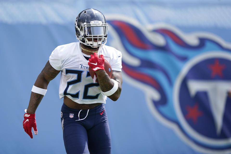 Tennessee Titans running back Derrick Henry looks for his second straight NFL rushing title this season. (AP Photo/Mark Humphrey)