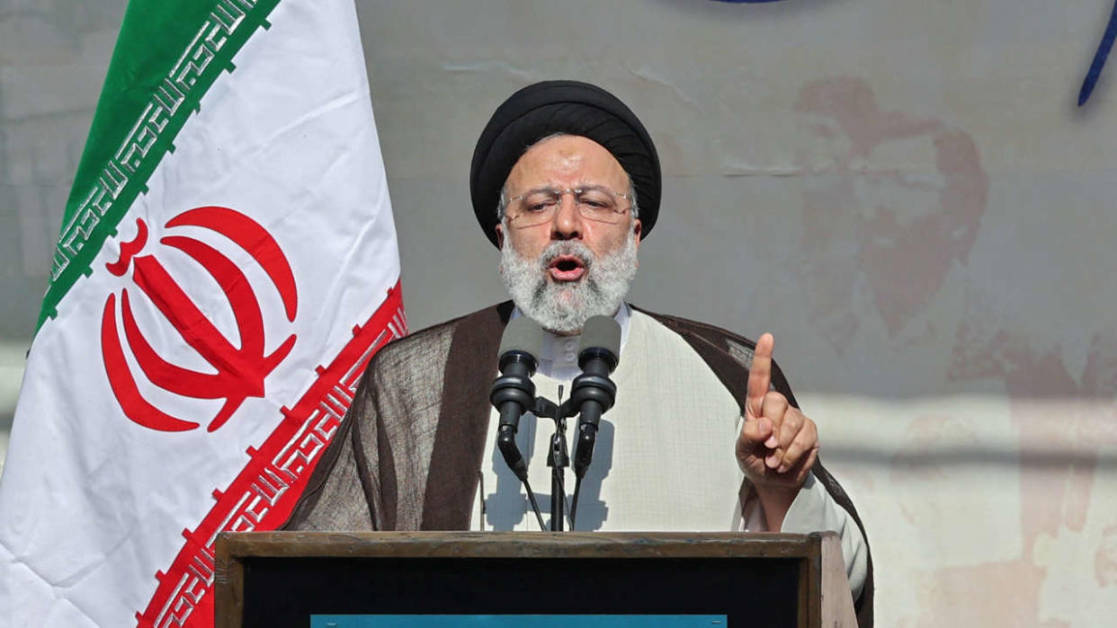 Iran's President Ebrahim Raisi speaks during a rally outside the former US embassy in the capital Tehran on November 4, 2022, to mark the 43th anniversary of the start of the Iran hostage crisis. - Iran's President Ebrahim Raisi today ridiculed a vow by US President Joe Biden to 