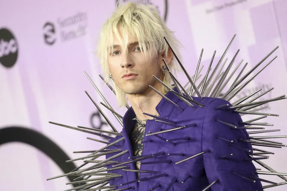 Machine Gun Kelly attends the 2022 American Music Awards astatine  Microsoft Theater connected  November 20, 2022 successful  Los Angeles, California.