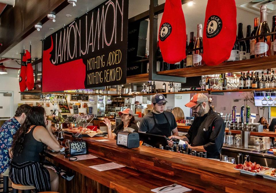 Jamón Jamón, a free-standing tapas bar, inside the Delray Beach Market food hall is an extension of the hall's gourmet market, Cellar and Pantry.