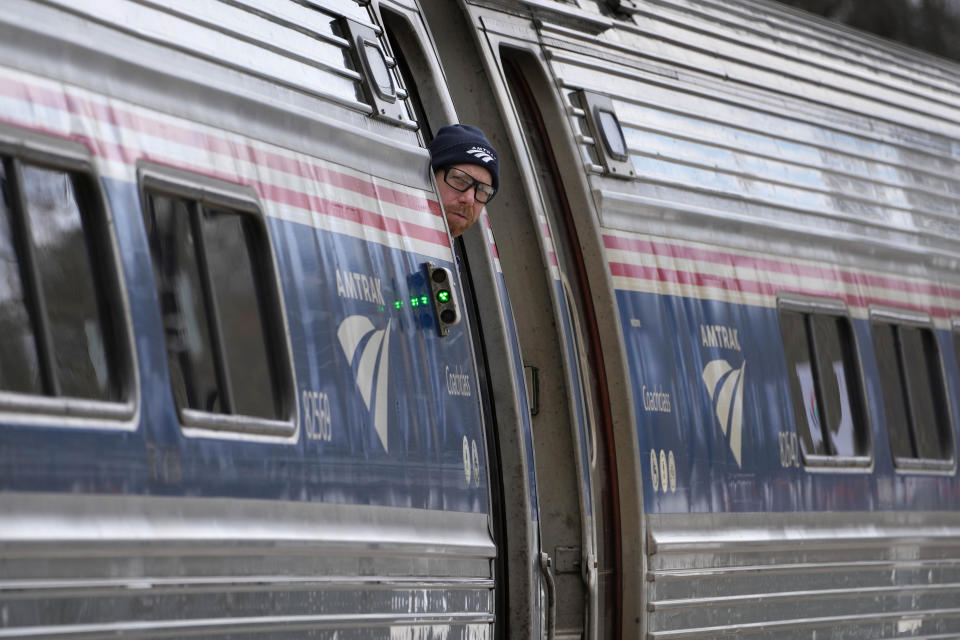 The Amtrak Downeaster departs at the station, Wednesday, March 8, 2023, in Freeport, Maine. The New Hampshire Liquor Commission says it is "exploring a creative solution" after saying an Amtrak route from Maine to Boston can't serve alcohol while passing through 35 miles of New Hampshire. (AP Photo/Robert F. Bukaty)