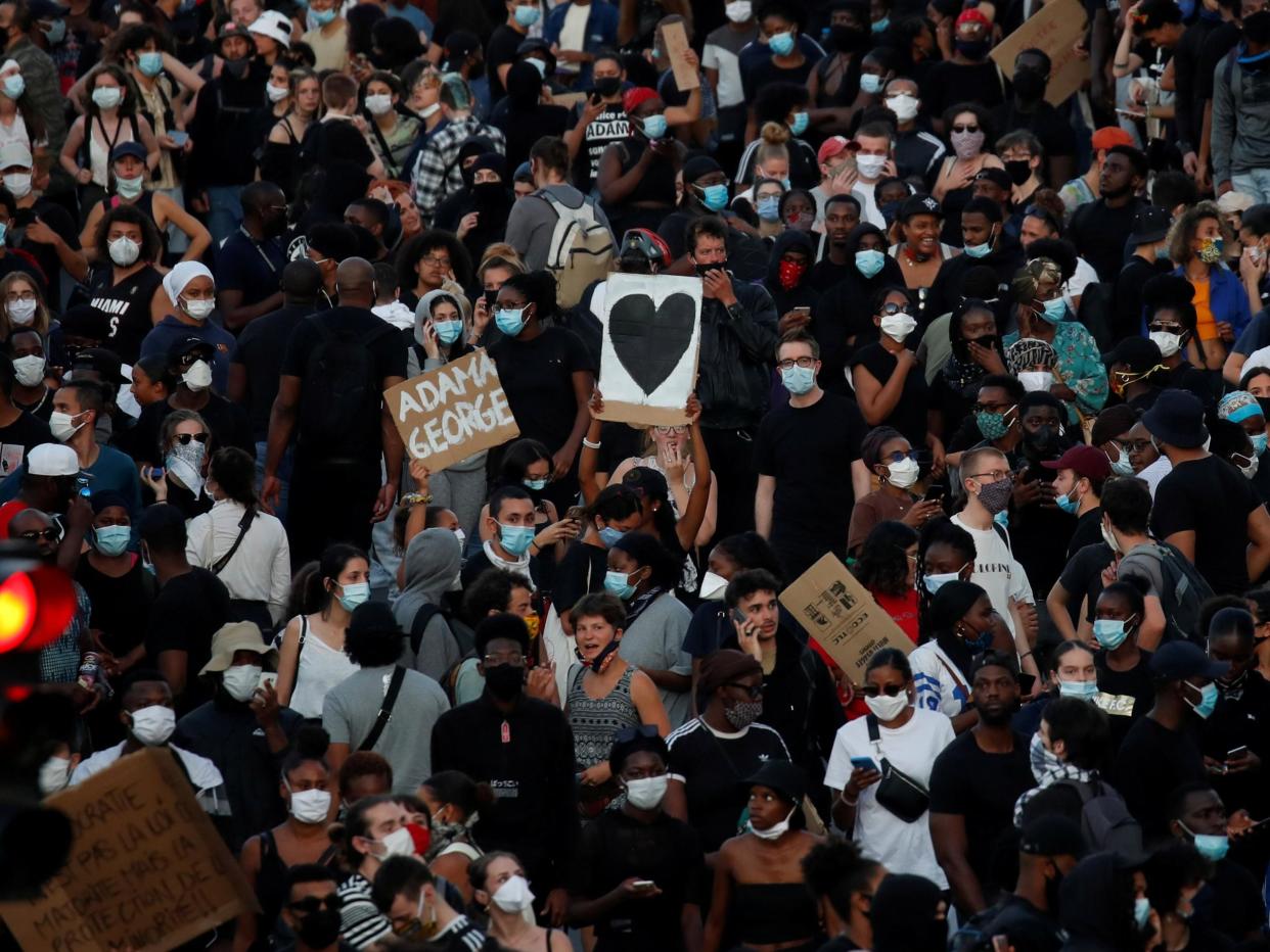 People attend a banned demonstration planned in memory of Adama Traore, France 2 June, 2020: Reuters