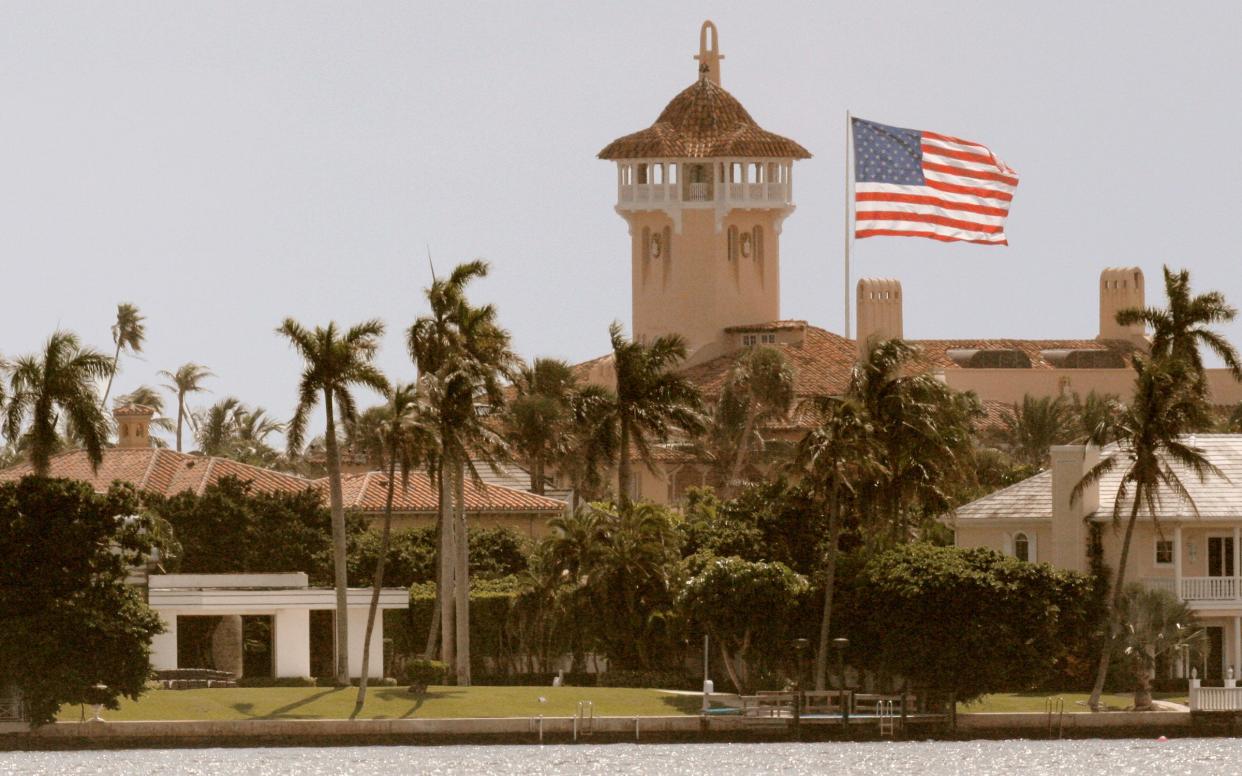The view  of Mar-a-Lago seen from above in "Palm Royale" features the massive American flag former President Trump installed in 2006.