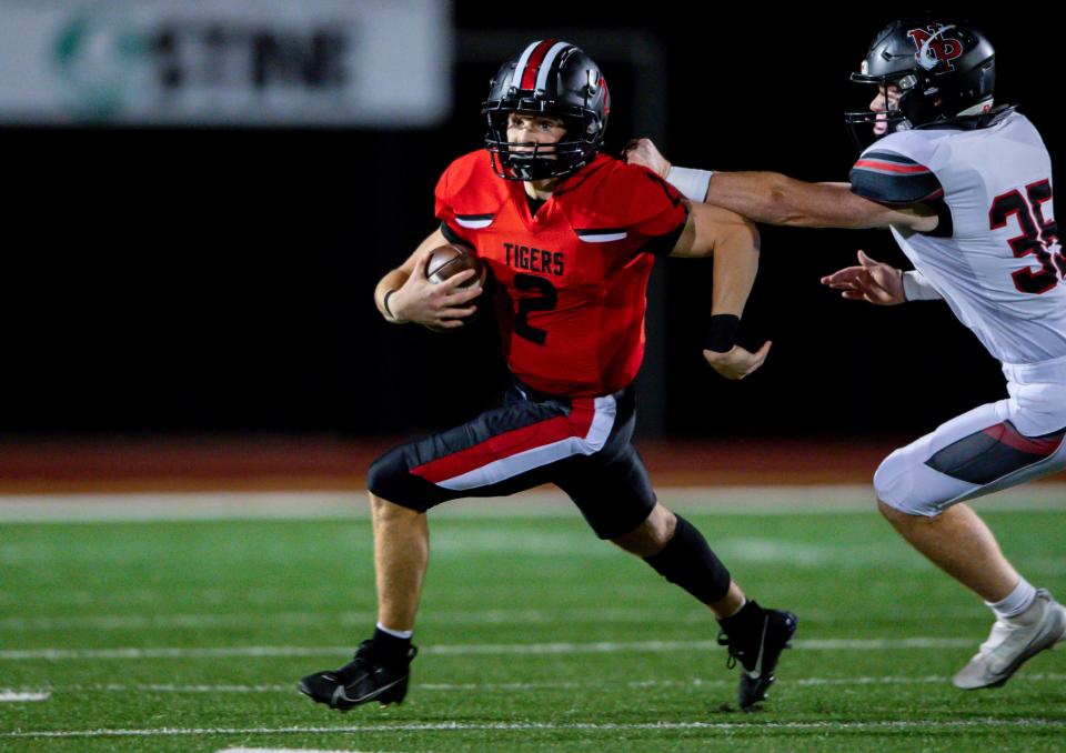 Aiden Flora of ADM runs with the ball during a game against North Polk on Oct. 20, 2023, at Adel High School.