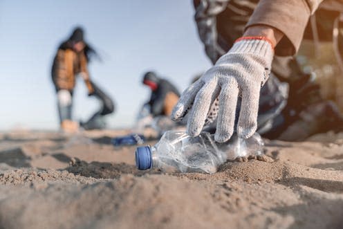   <span class="attribution"><a class="link " href="https://www.shutterstock.com/image-photo/volunteer-man-collecting-trash-on-beach-1521472085" rel="nofollow noopener" target="_blank" data-ylk="slk:Inside Creative House/Shutterstock;elm:context_link;itc:0;sec:content-canvas">Inside Creative House/Shutterstock</a></span>